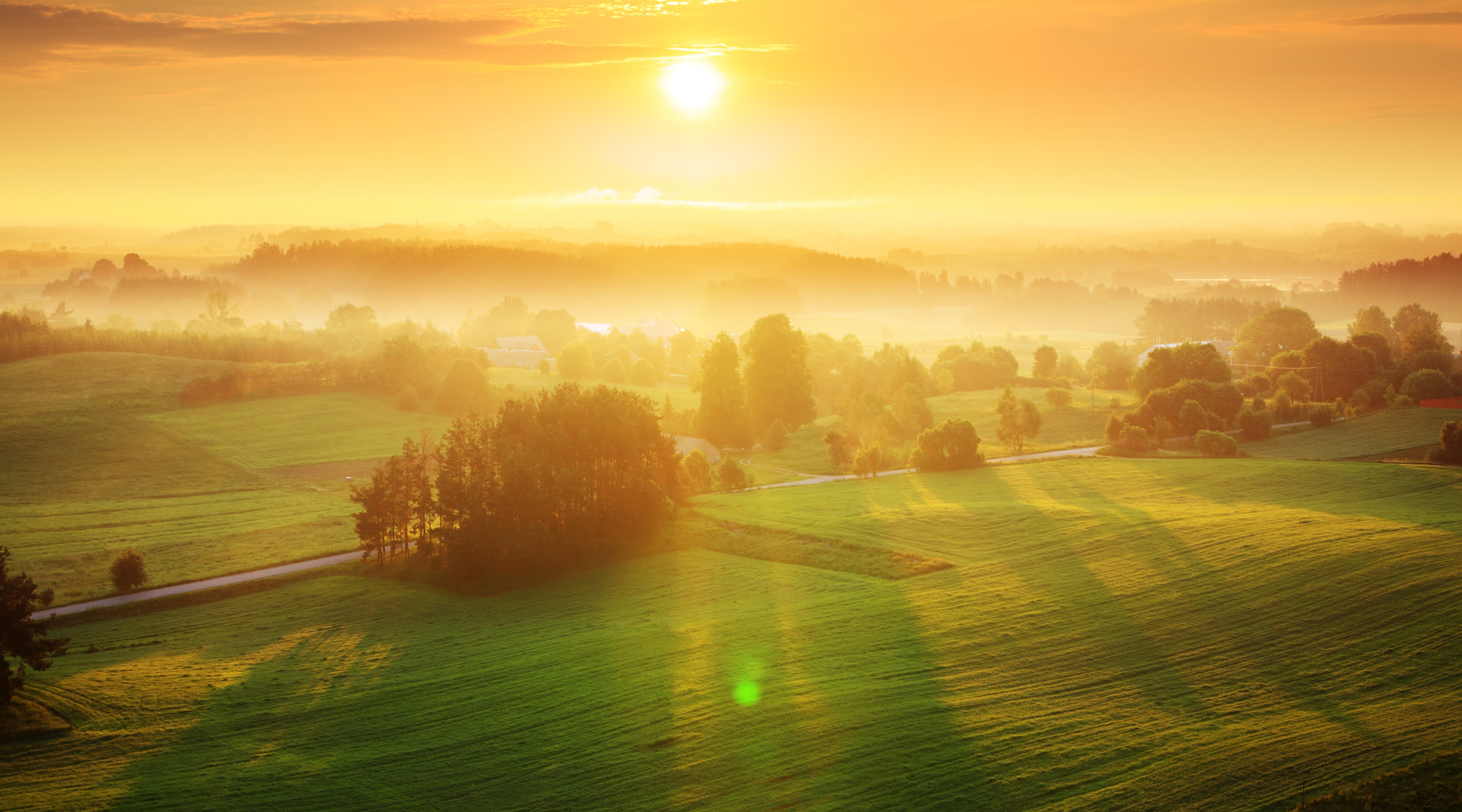 Beautiful green landscape with morning golden sunrise. 