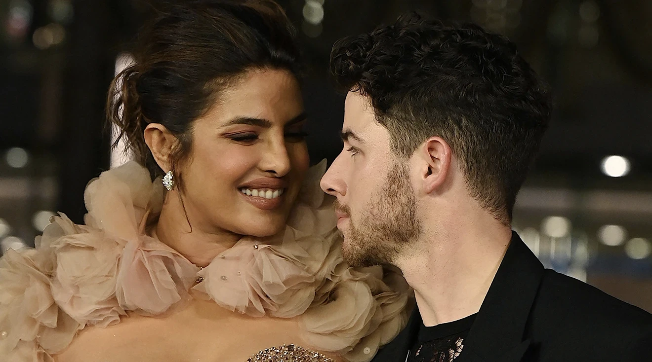 Priyanka Chopra and her husband musician Nick Jonas pose for pictures during the inauguration of the Cultural Centre (NMACC) at the Jio World Centre (JWC) in Mumbai on March 31, 2023