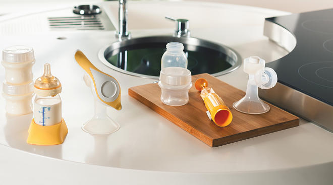 breast pump materials on kitchen counter