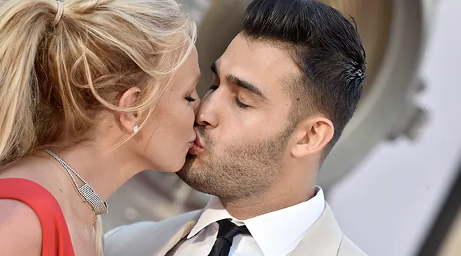britney spears and Sam Asghari kissing on red carpet of "Once Upon A Time...In Hollywood" movie premiere in July 2019