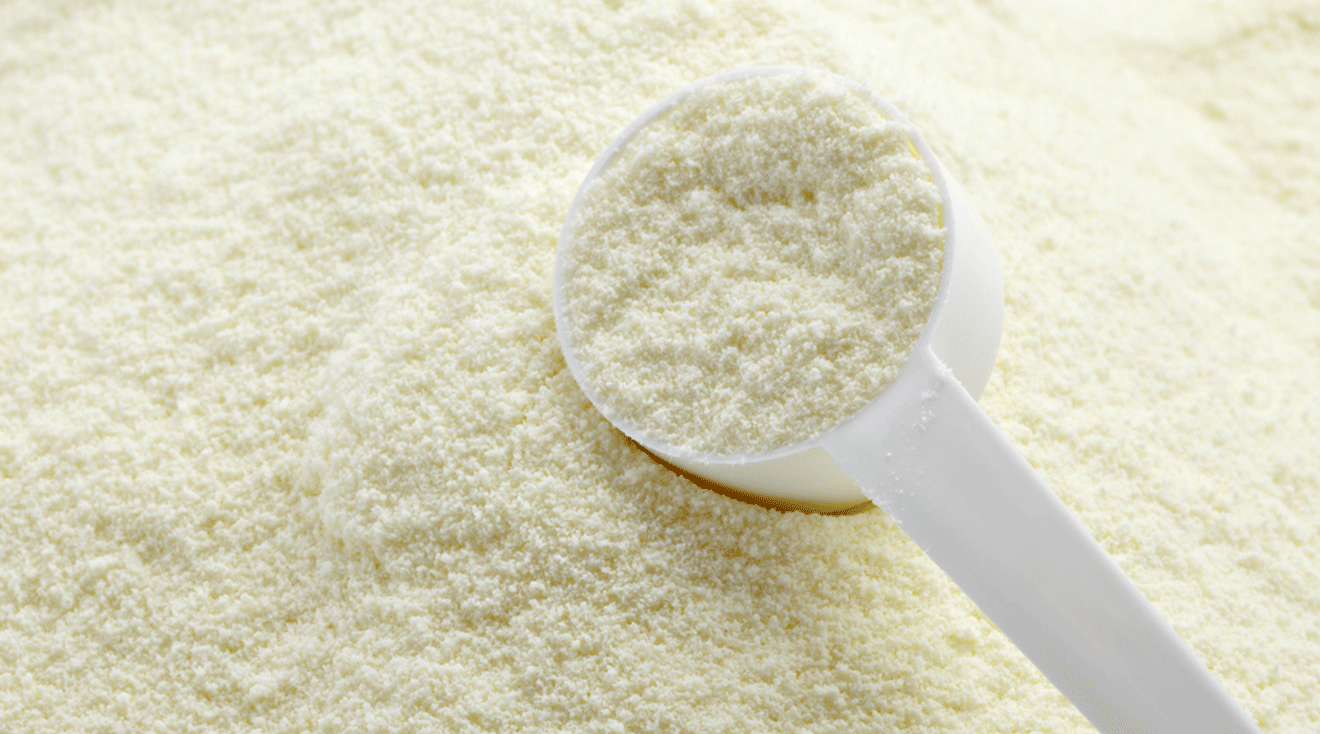 close up of baby formula with scoop