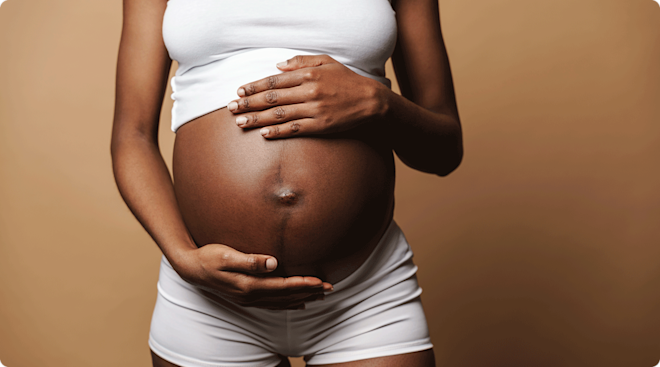 close up of pregnant woman's belly