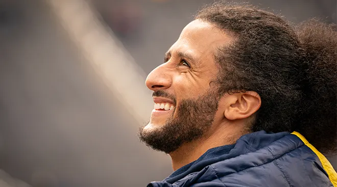 colin kaepernick interacting with fans during spring football game in michigan