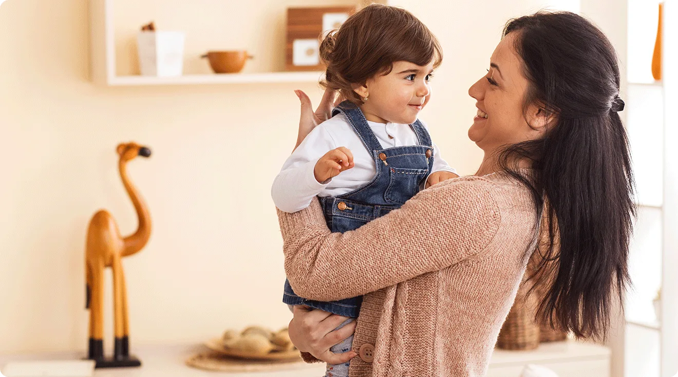 young mom and toddler at home