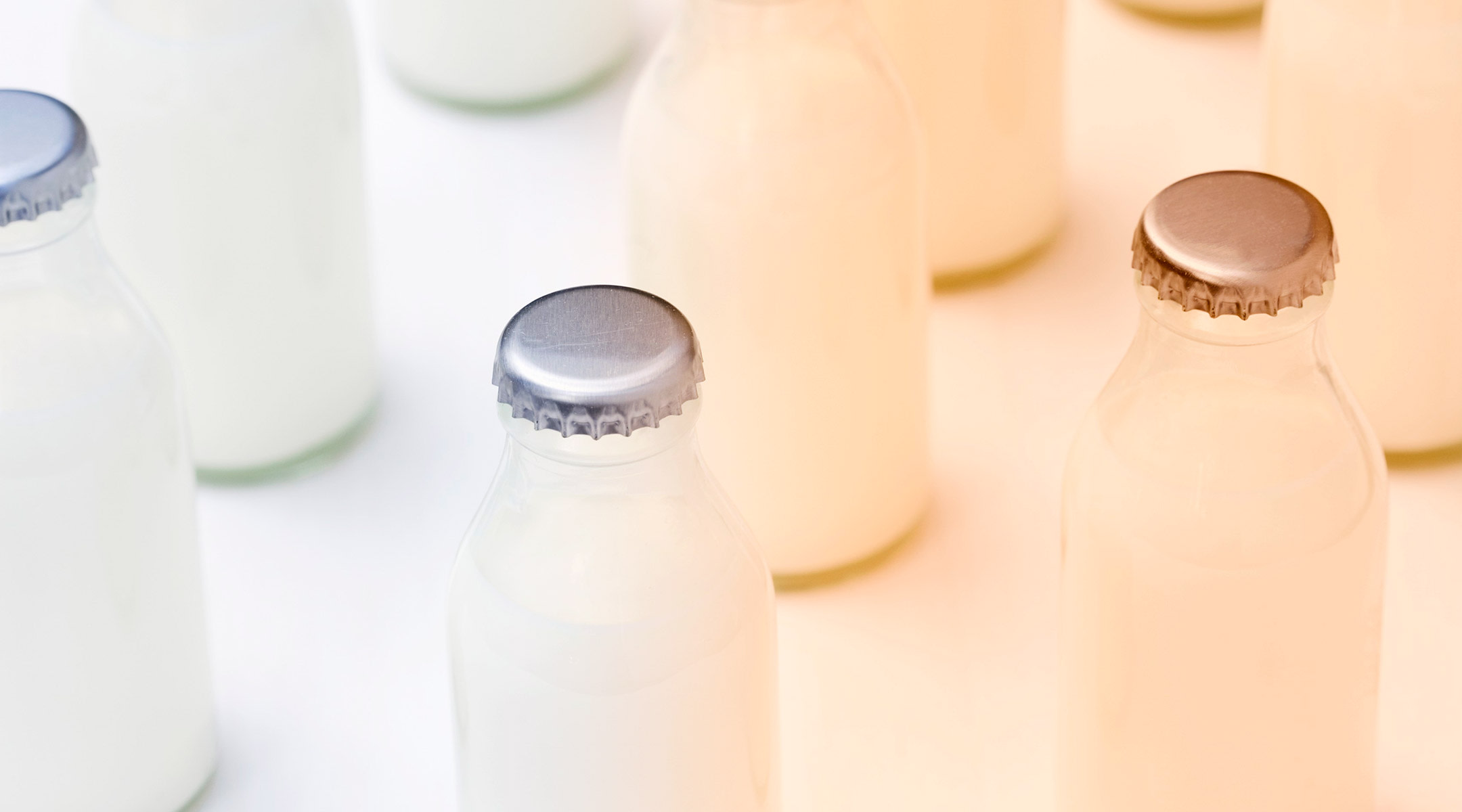 tinted gradient over bottle of milk