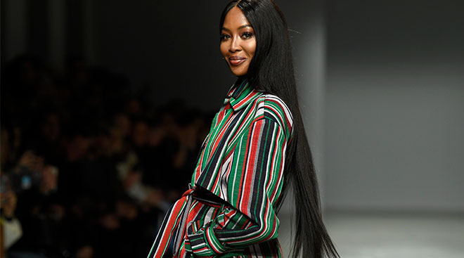 Model Naomi Campbell walks the runway and is a new mom. 