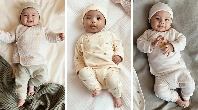 three babies wearing the new H&M cradle to cradle clothing line