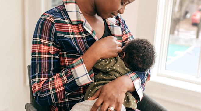 mom breastfeeding her young baby