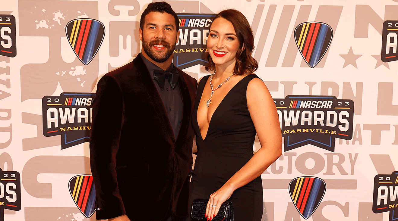 NASCAR Cup Series driver, Bubba Wallace and wife, Amanda Wallace pose for photos on the red carpet prior to the NASCAR Awards and Champion Celebration at the Music City Center on November 30, 2023 in Nashville, Tennessee