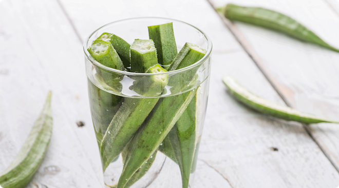 A glass of okra infused water.