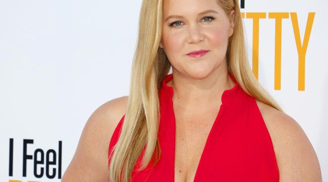 amy schumer wearing a red dress