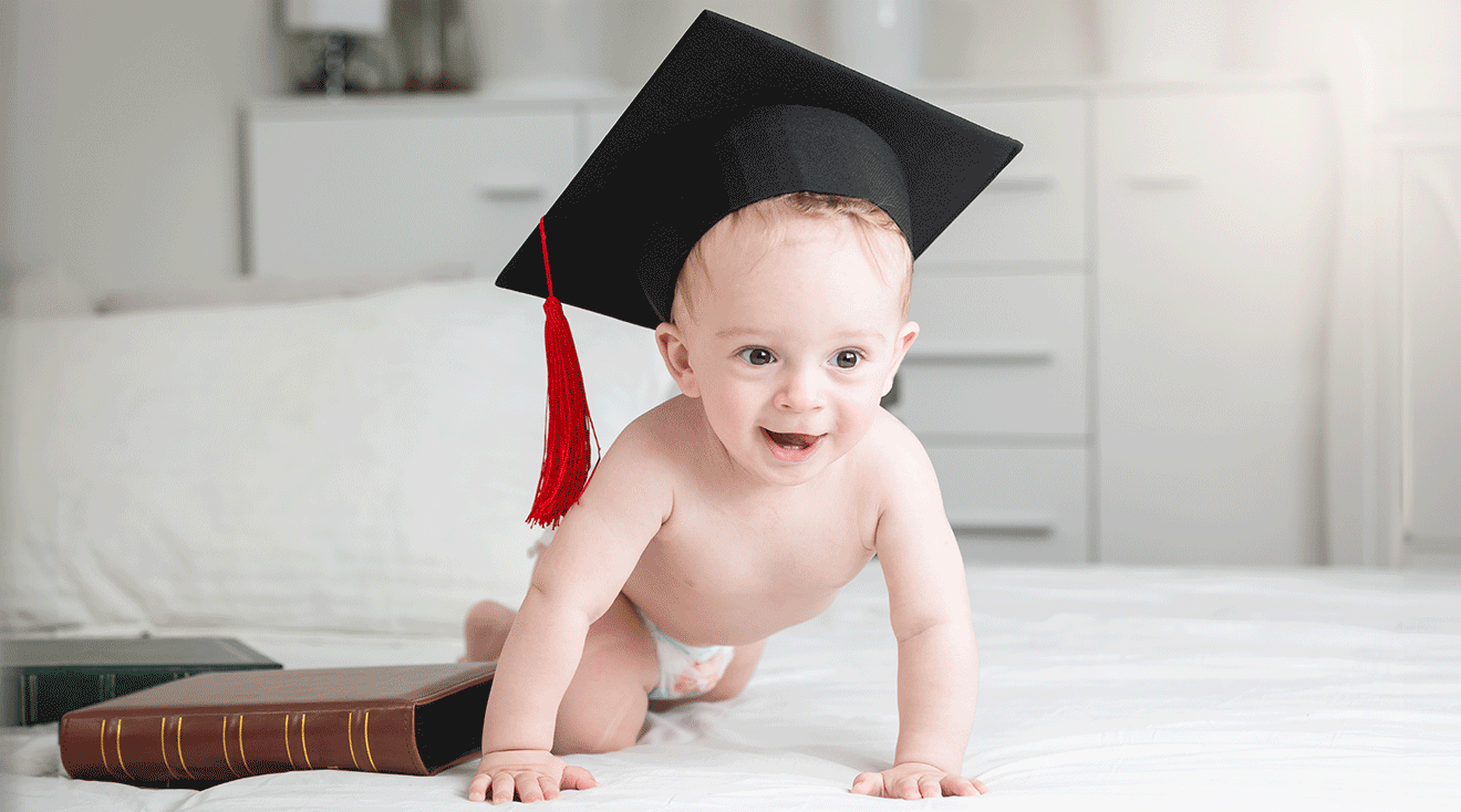 baby wearing a graduation cap