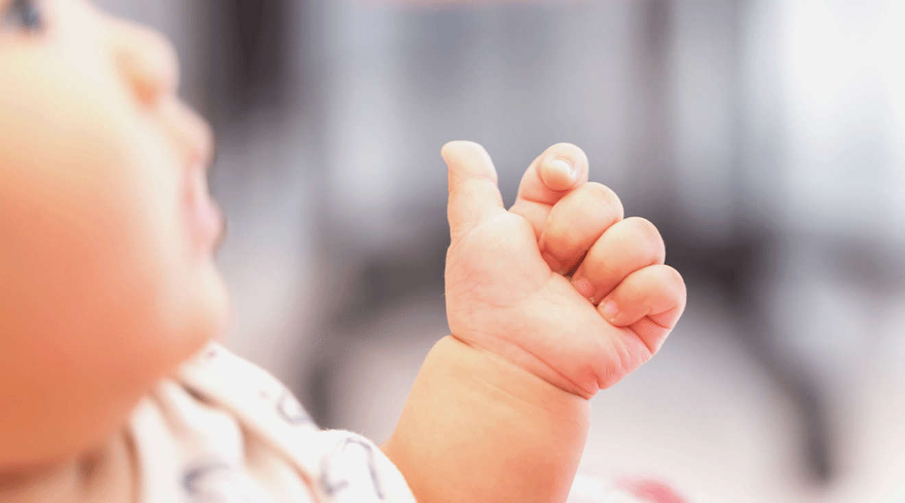 baby talking with hands