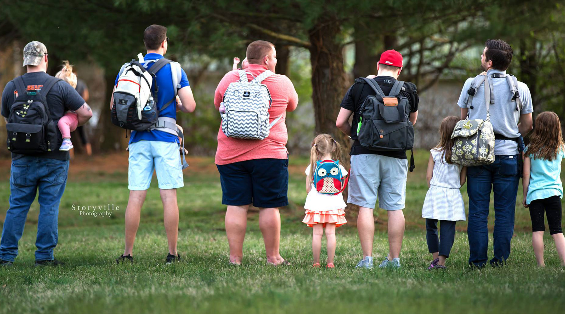 photo series featuring real men wear diaper bags