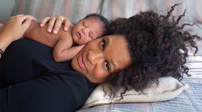 Cosmo Magazine's Beauty Director, Julee Wilson pictured with her newborn son