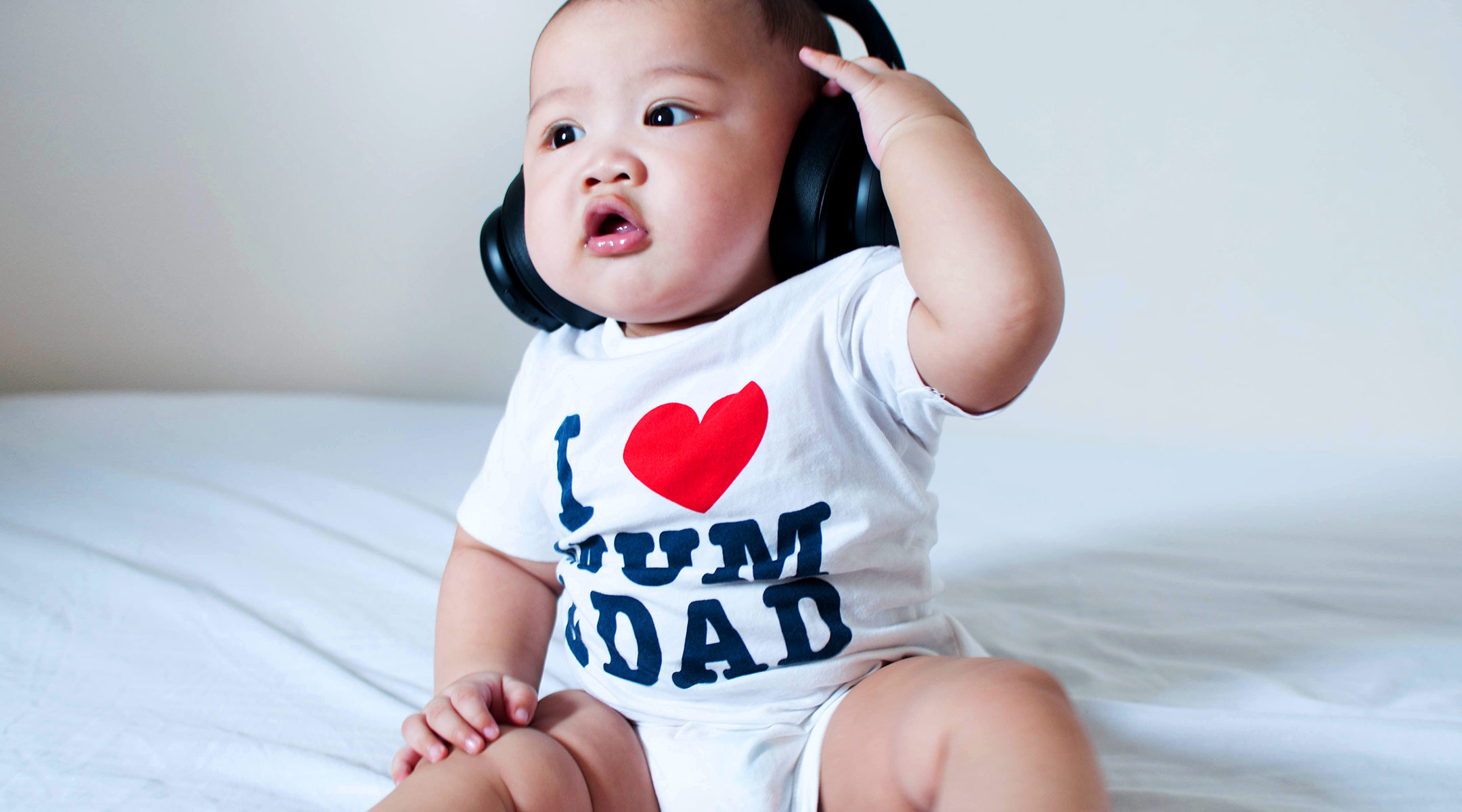 baby listening to music with headphones