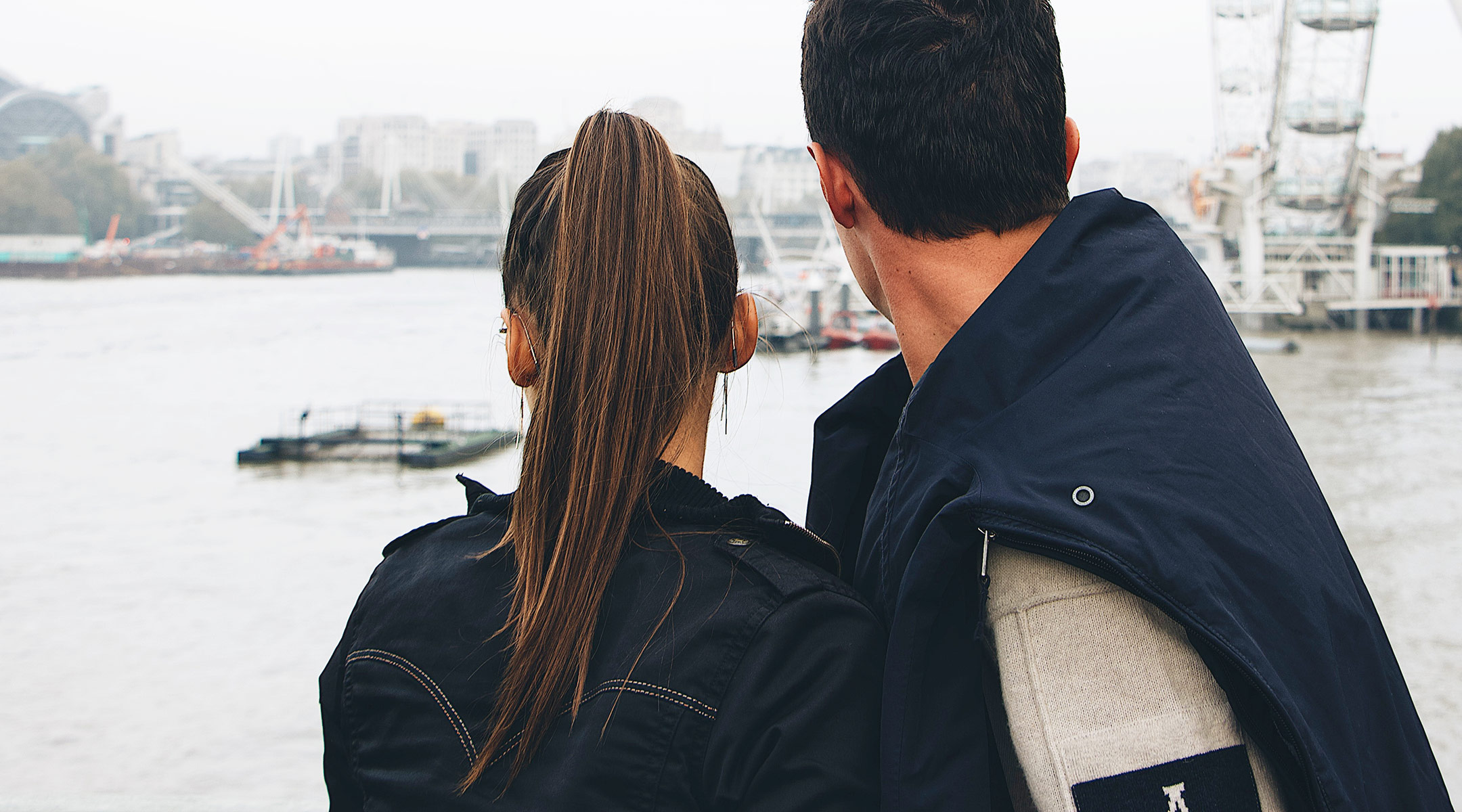 couple looking away over body of water