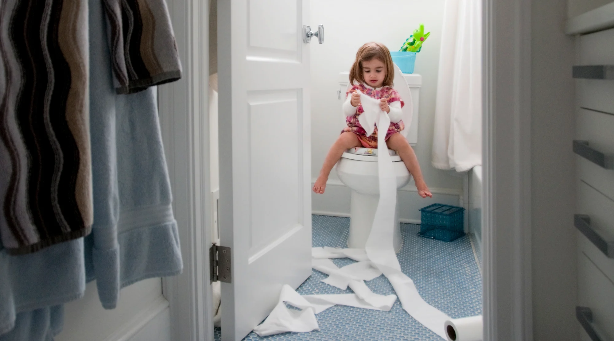 Little girl uses bathroom and learns how to potty train
