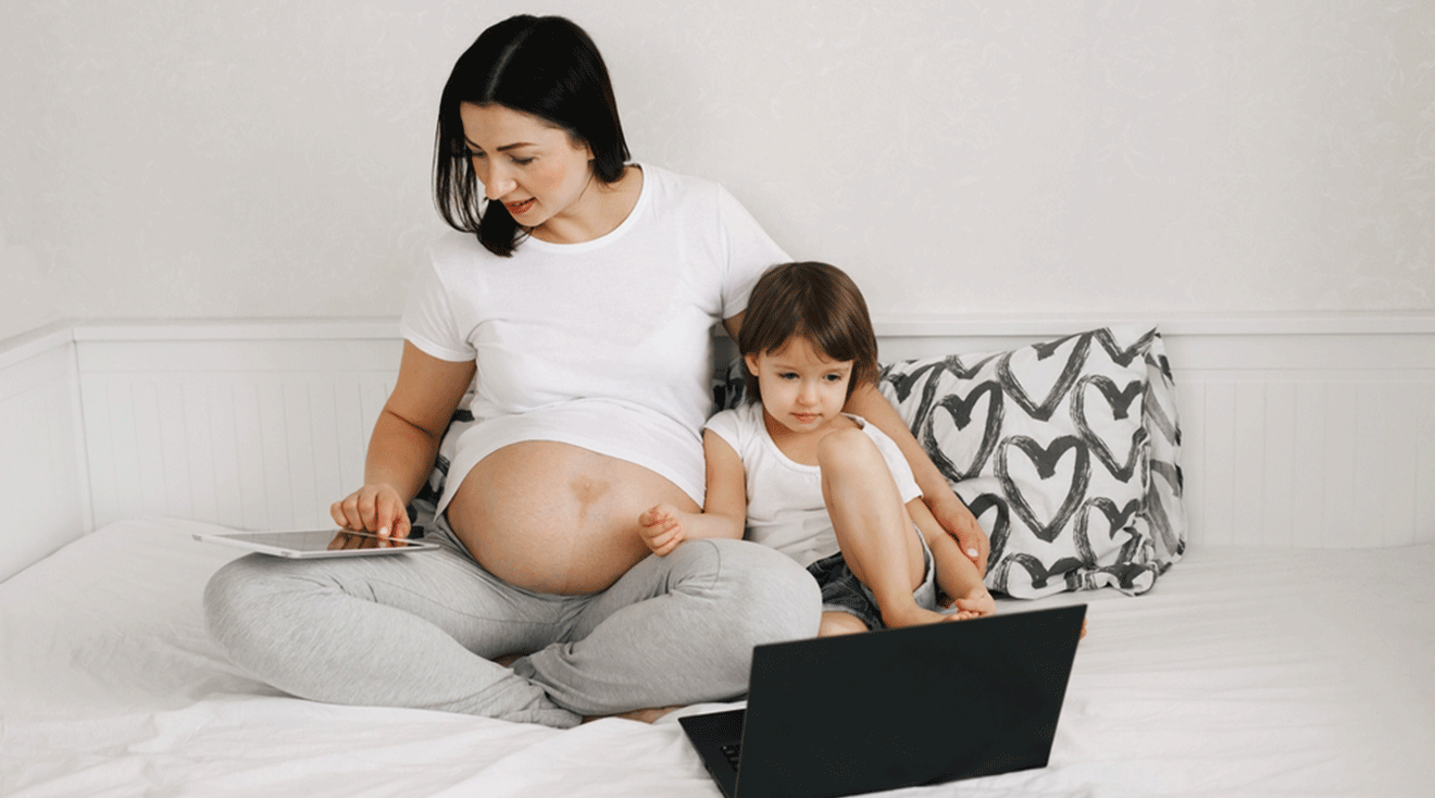 pregnant mom and toddler shopping online