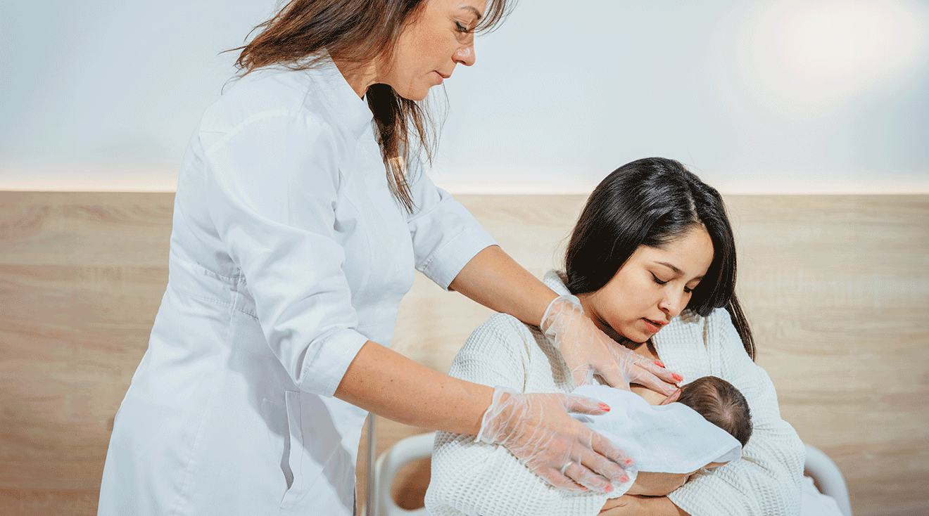 lactation consultant helping mother breastfeeding newborn baby