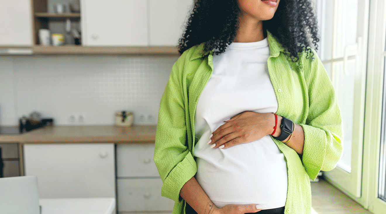 pregnant woman holding belly