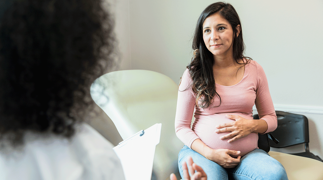 pregnant woman at doctor's office