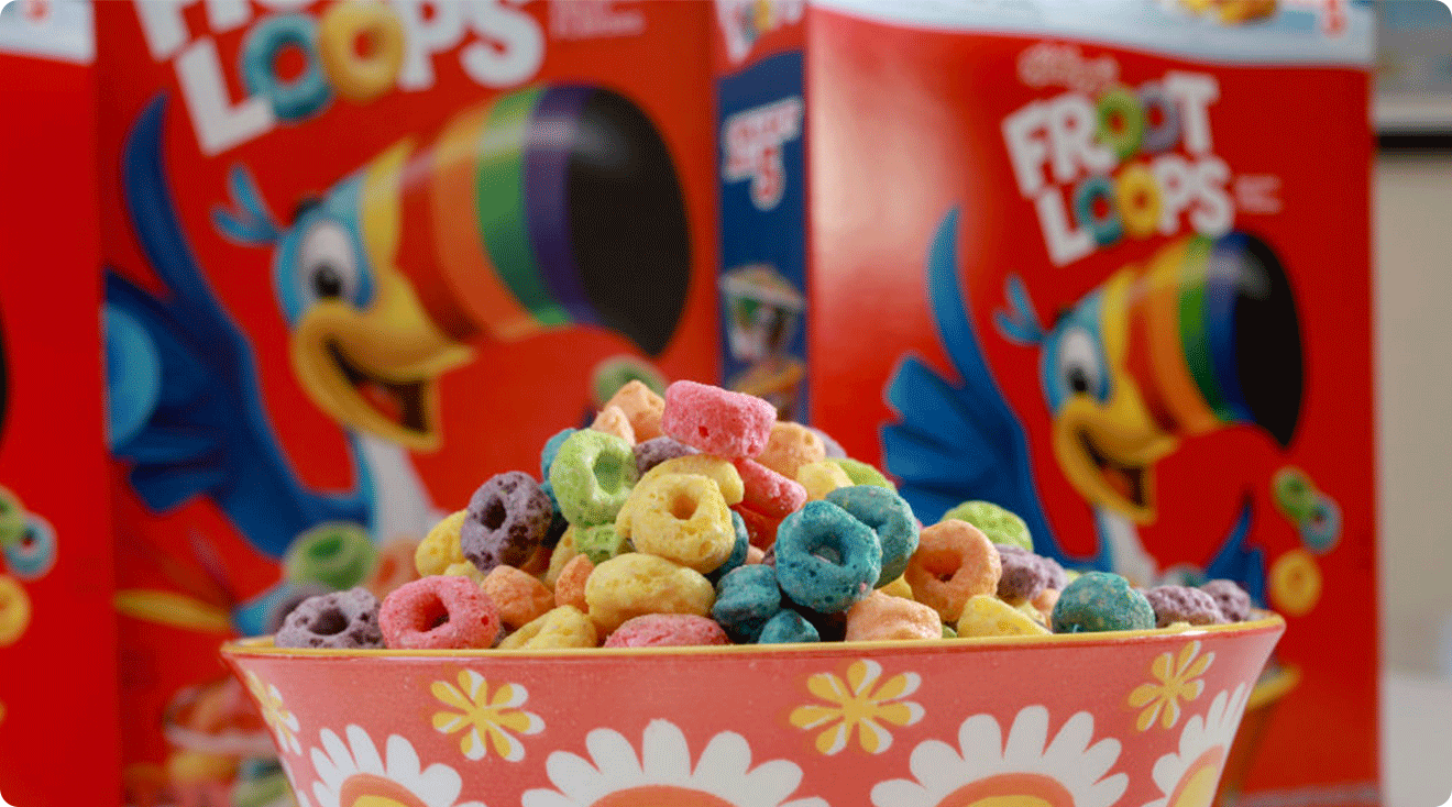 bowl of froot loops with froot loop boxes in the background