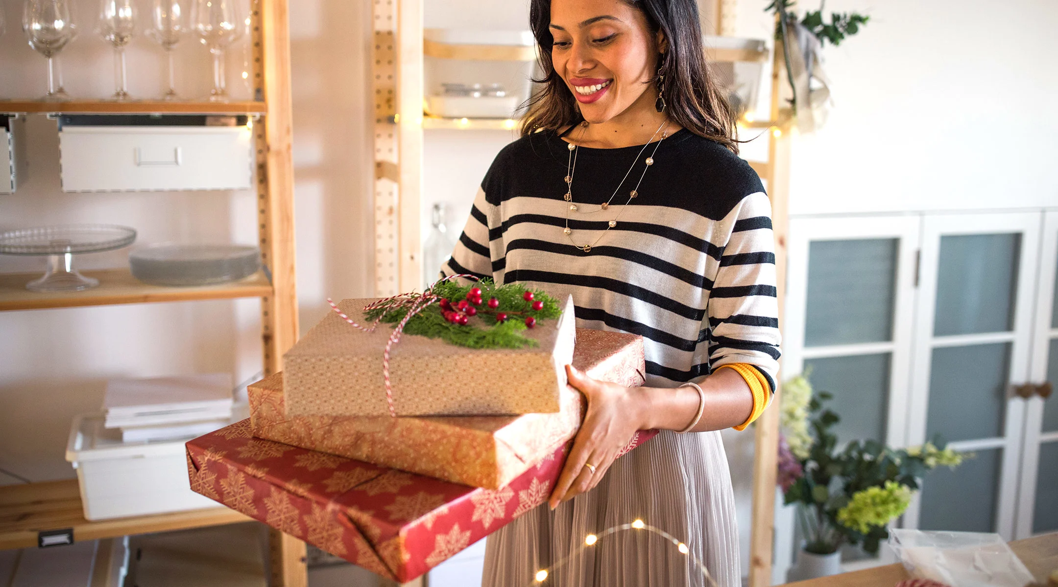 mom carrying her holiday presents