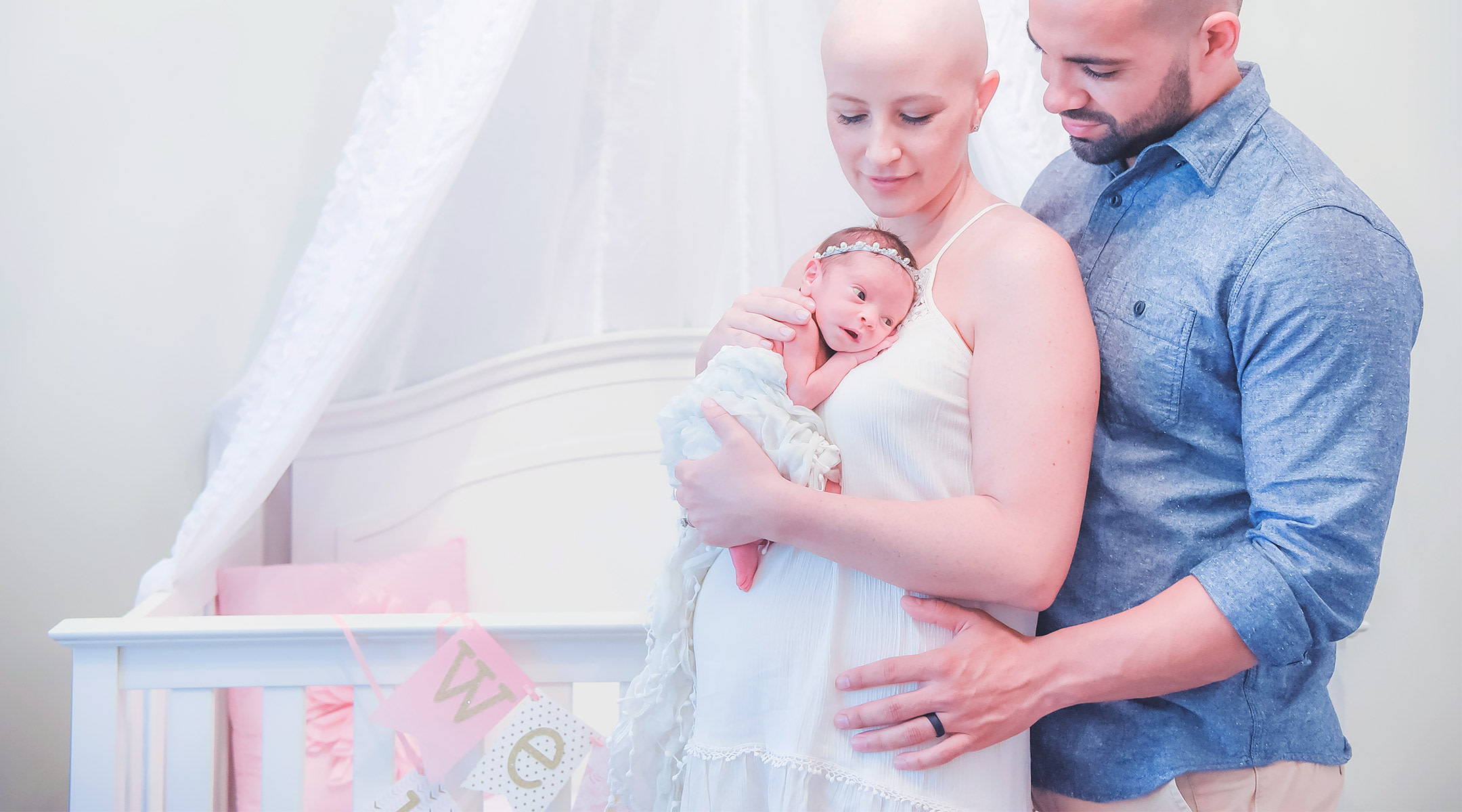 mom who was diagnosed with cancer during her pregnancy, with her newborn baby and partner.