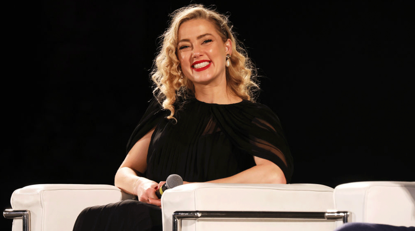 Amber Heard speaks on the stage during the 69th Taormina Film Festival on June 24, 2023 in Taormina, Italy