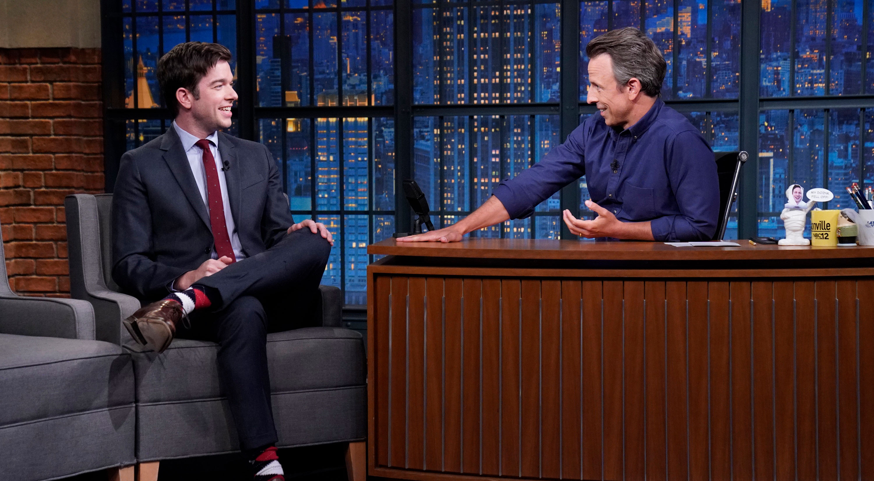John Mulaney announces pregnancy news during Late Night with Seth Meyers