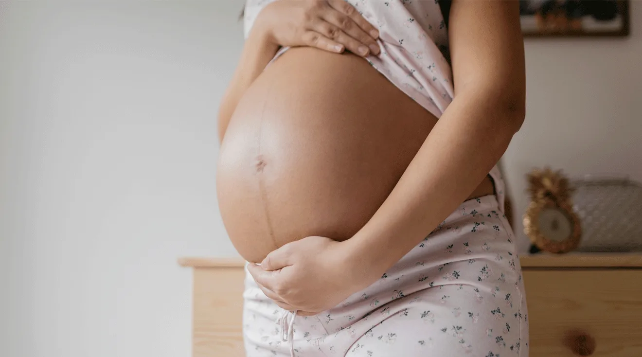 close up of pregnant belly