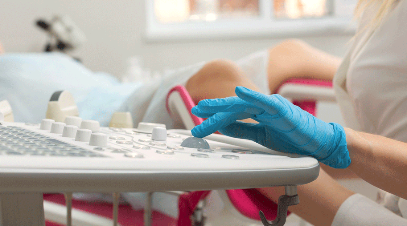 gynecologist performing a vaginal ultrasound