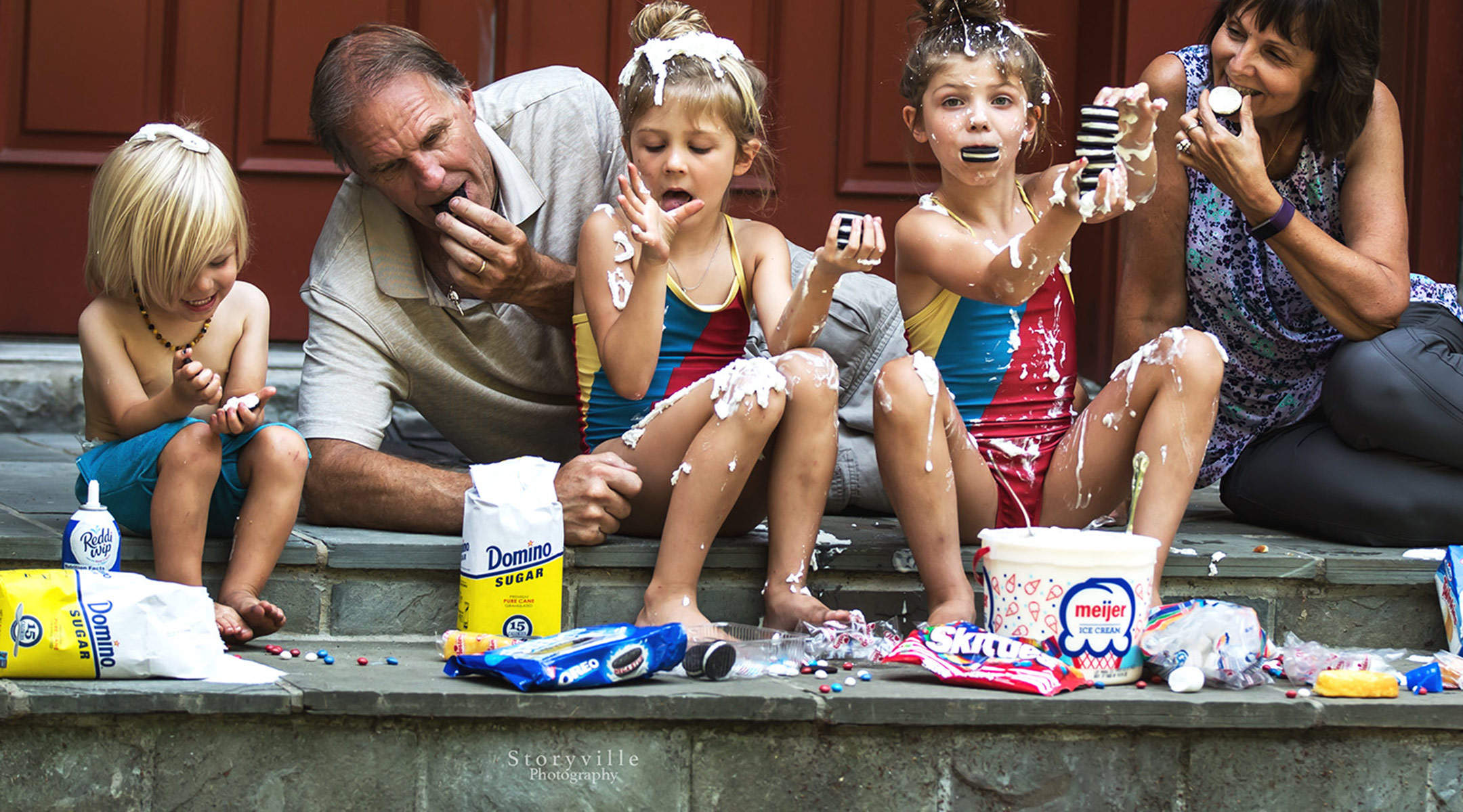 funny photo shoot showing grandparents spoiling their grandkids with oreos and sugar