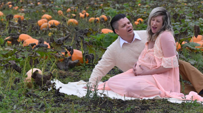 couple stages scary halloween theme pregnancy and birth shoot
