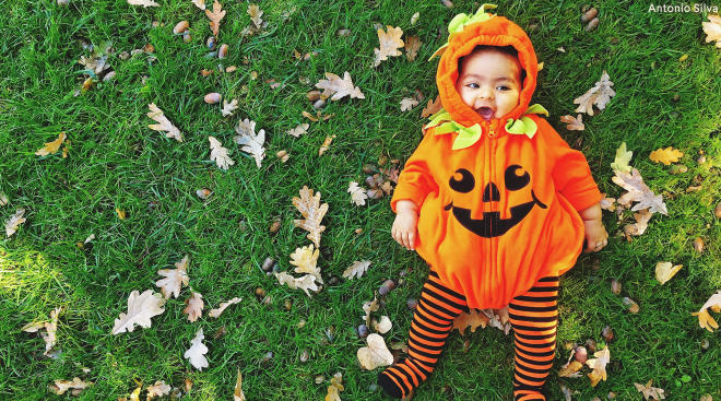 toddler dressed up as pumpkin for halloween