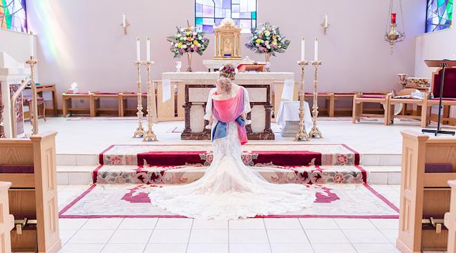 Wedding pictures of an Ohio bride babywearing her daughter on her wedding day.