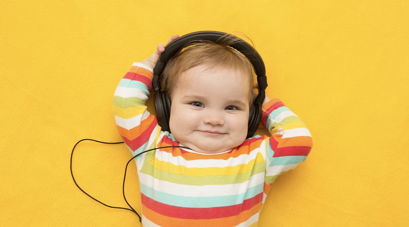 Toddler wearing headphones
