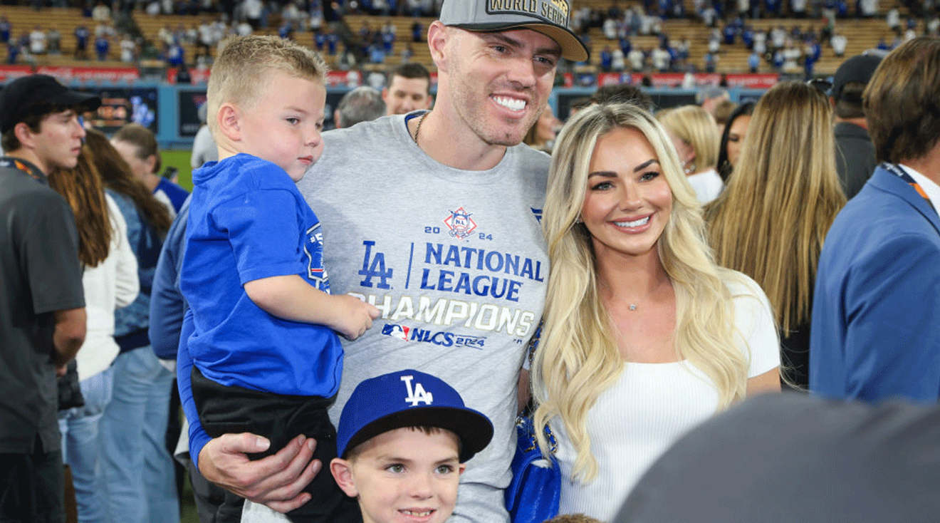 Freddie Freeman #5 of the Los Angeles Dodgers poses for a photo with his family after defeating the New York Mets in Game 6 of the NLCS presented by loanDepot at Dodger Stadium on Sunday, October 20, 2024 in Los Angeles, California