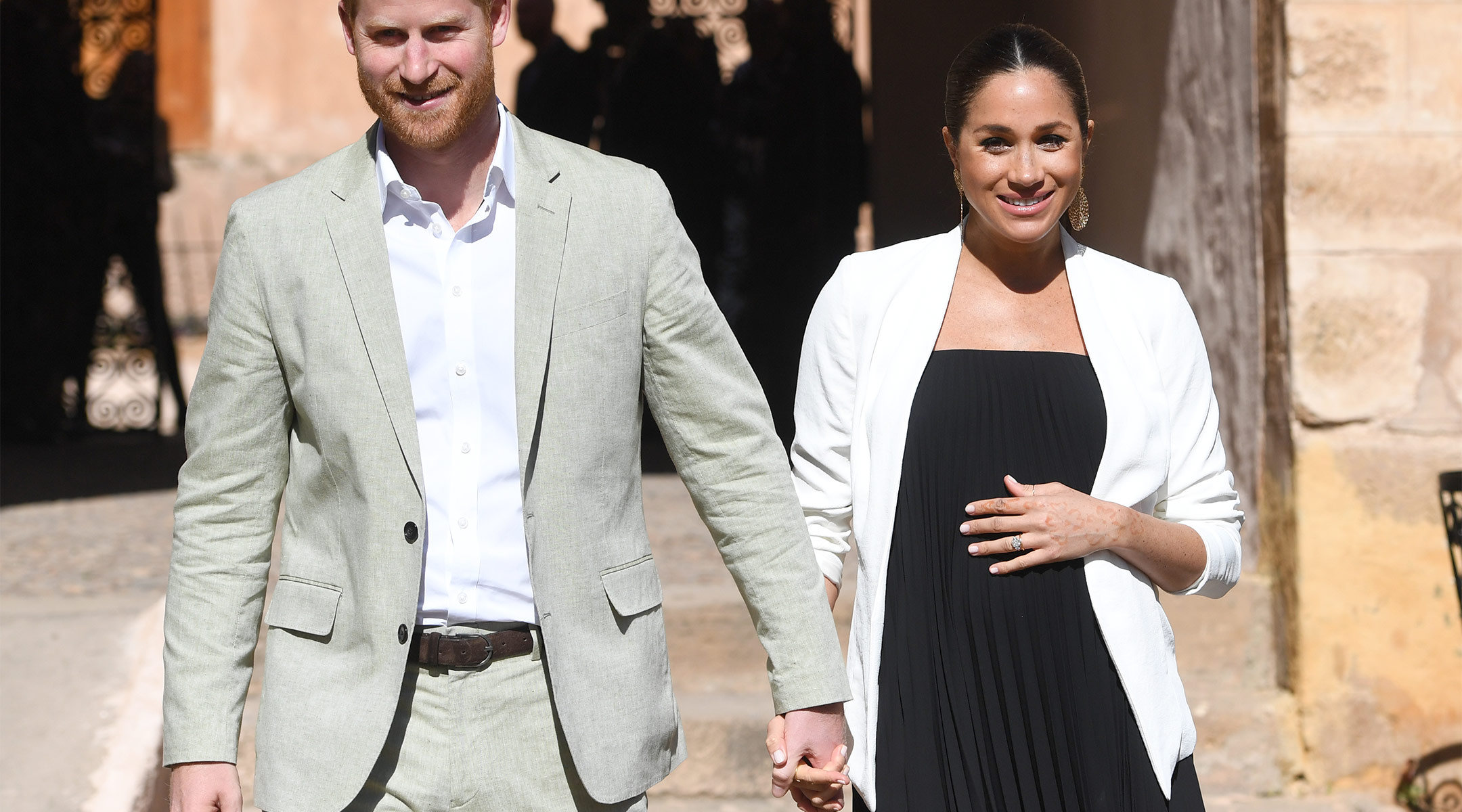 pregnant meghan markle walking with prince harry