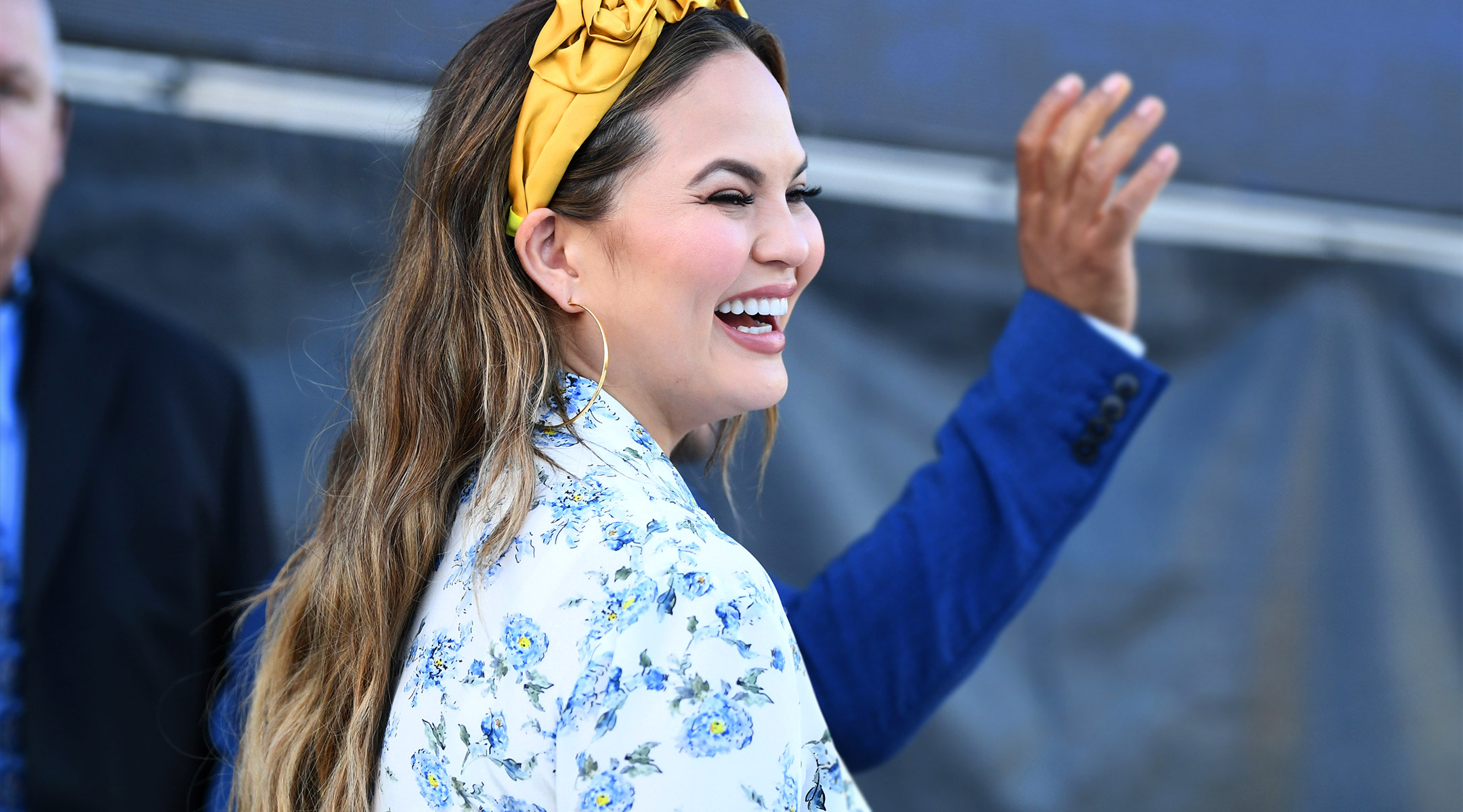 chrissy teigen laughing, posted about spilling her breast milk on twitter