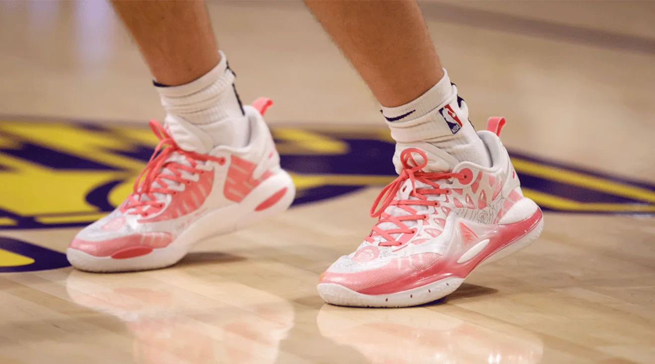 The pink sneakers worn by Austin Reaves #15 of the Los Angeles Lakers 