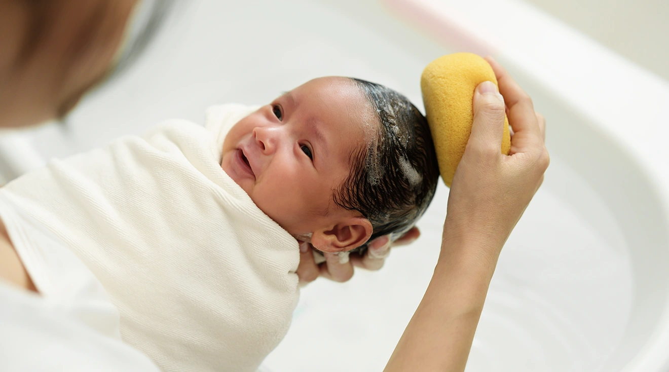 Babys First Bath How to Bathe a Newborn