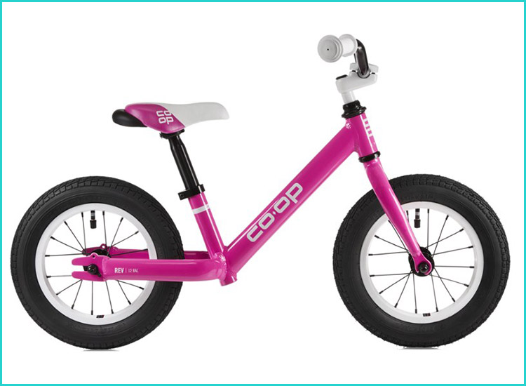 pink balance bike with basket