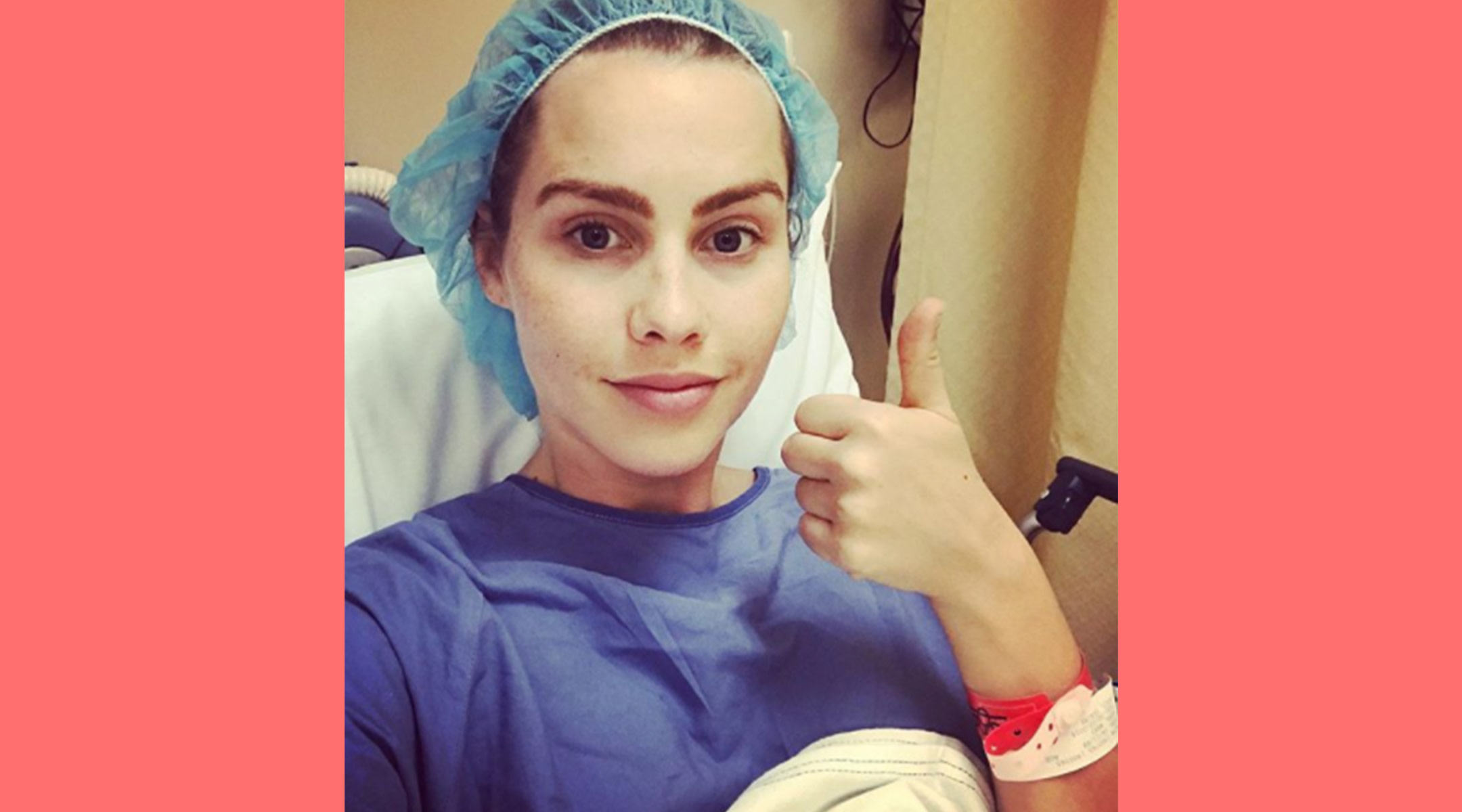 Claire Holt in hospital garb giving thumbs up