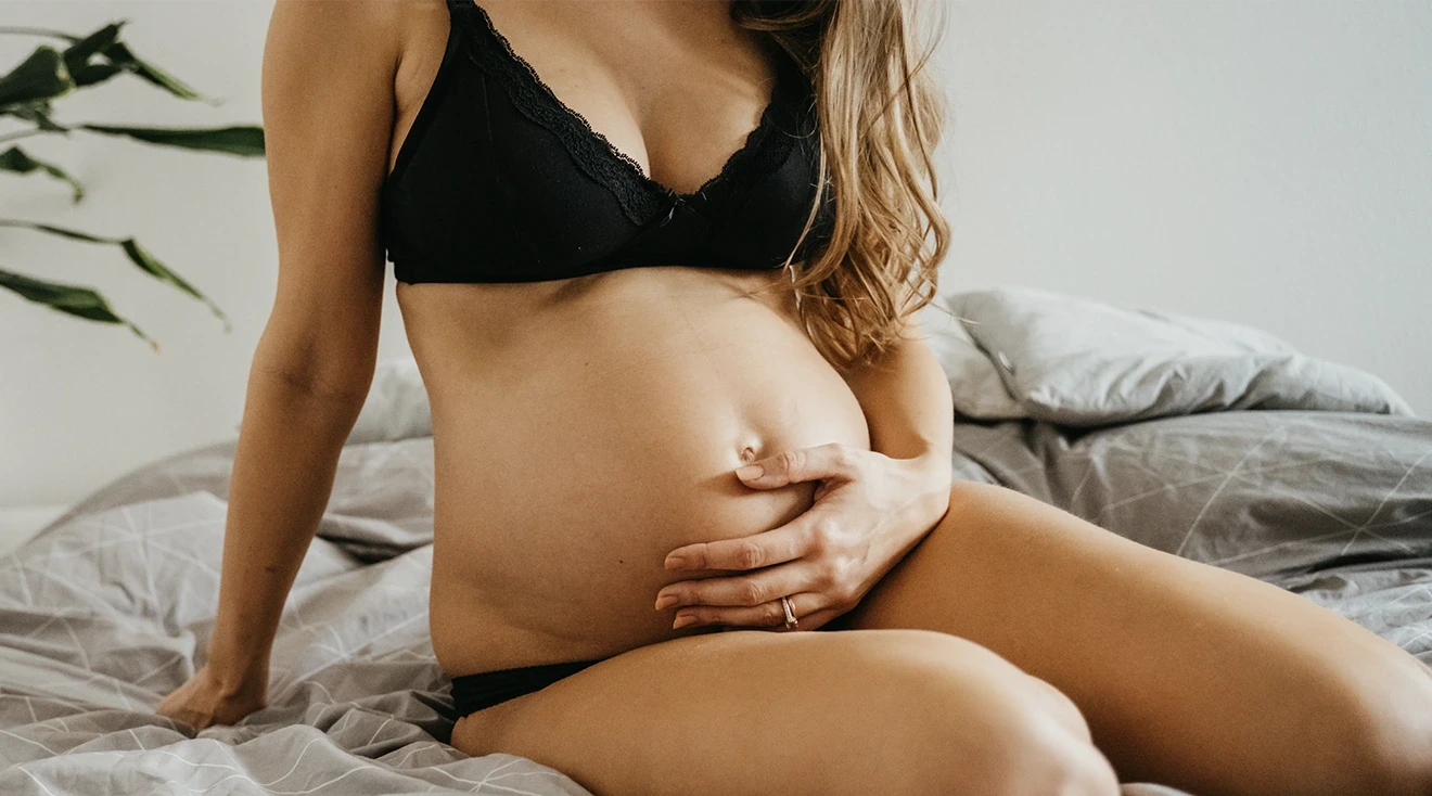 pregnant woman wearing maternity lingerie 