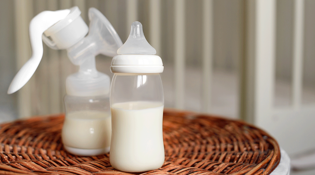 breast milk in breast pump and baby bottle