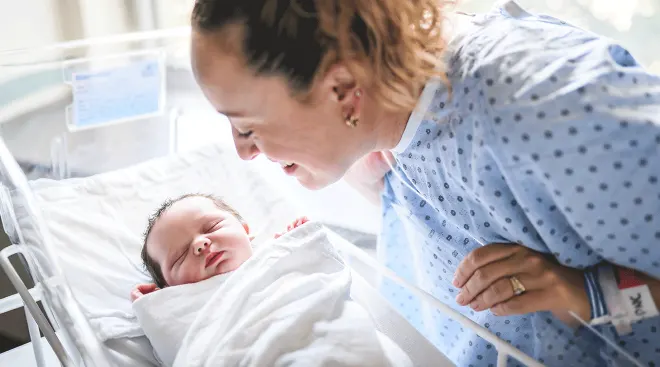 mother and newborn baby in hospital after labor and delivery