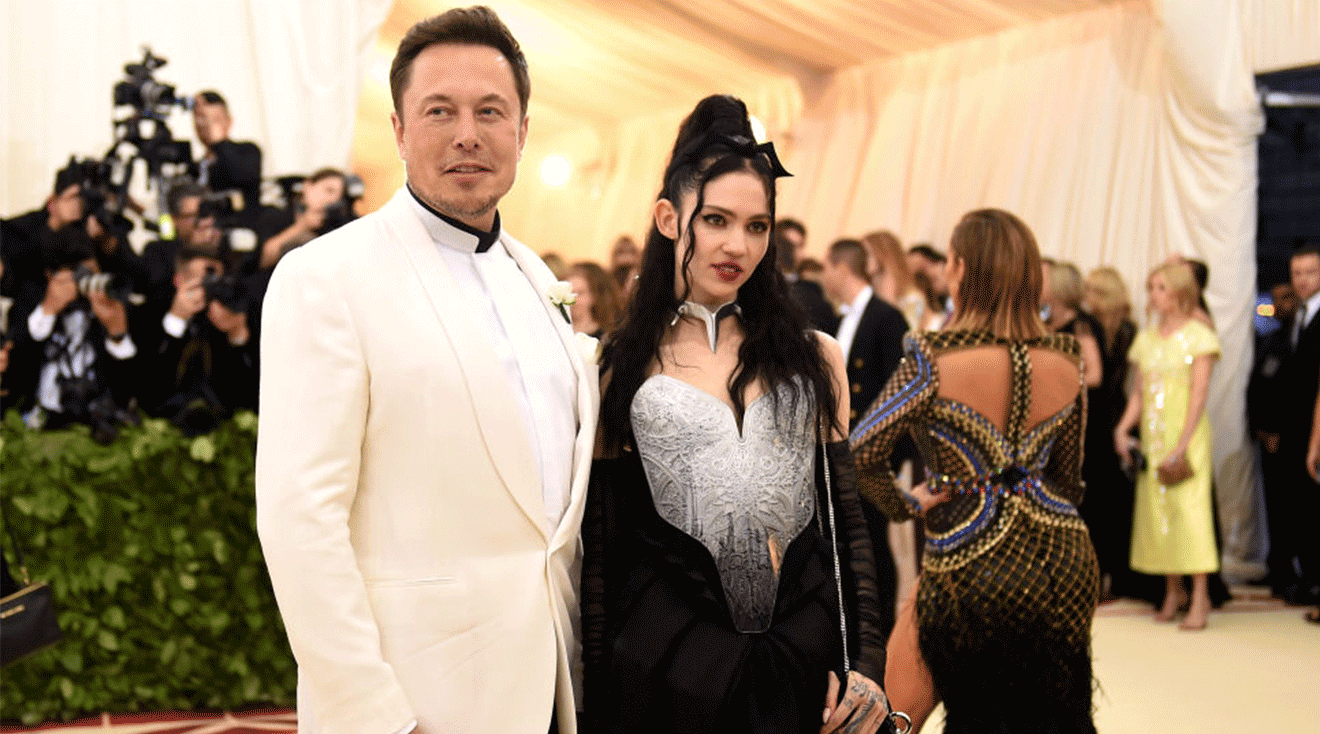 Elon Musk and Grimes attend the Heavenly Bodies: Fashion & The Catholic Imagination Costume Institute Gala at The Metropolitan Museum of Art on May 7, 2018 in New York City