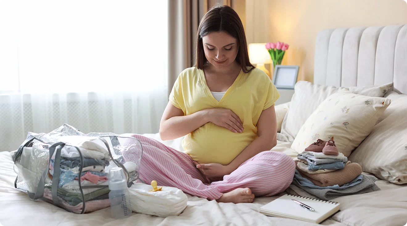 pregnant mom organizing baby products at home